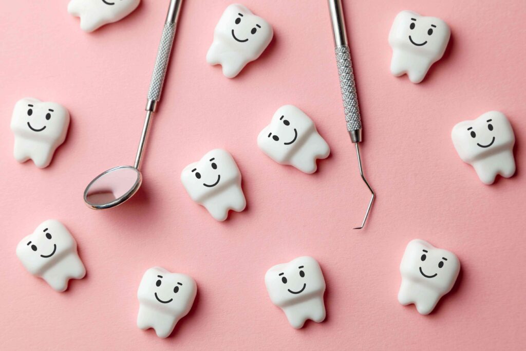 Happy teeth and dental tools